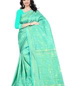 Green woven banarasi saree with blouse