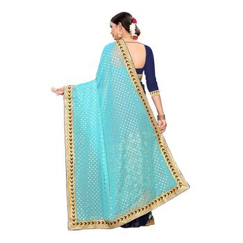 Turquoise embroidered georgette saree with blouse 4