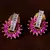 Ruby and American Diamond Embellished Gold Plated Stud Earrings 216ED212