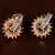 Champagne Stone and American Diamond Embellished Gold Plated Stud Earrings 216ED213