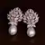 Rose Gold Plated Pearl and American Diamond Embellished Stud Earrings 216ED220