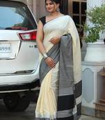 Off white plain linen saree with blouse