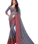 Grey embroidered georgette saree with blouse