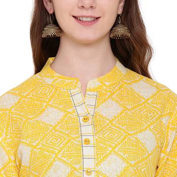 Yellow printed cotton kurtas and kurtis 5
