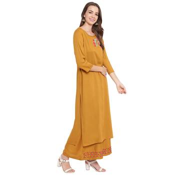Yellow embroidered rayon kurtas and kurtis 4