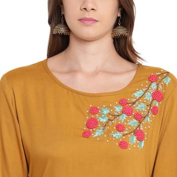 Yellow embroidered rayon kurtas and kurtis 5