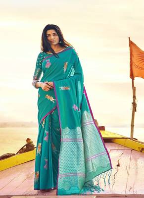   turquoise woven silk blend saree with blouse 1