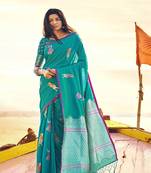   turquoise woven silk blend saree with blouse