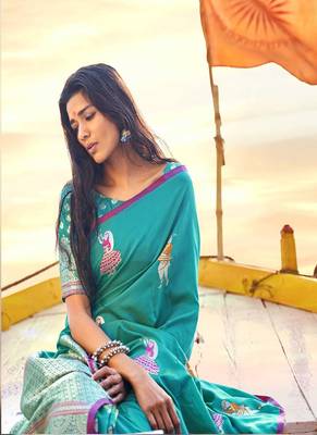   turquoise woven silk blend saree with blouse 3
