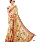 Cream printed banarasi silk saree with blouse