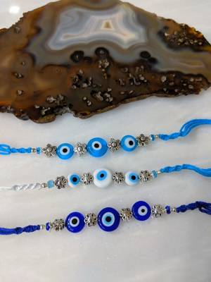Set Of 3 White Blue Evil Eye Silver Flower Beads Multicolor Thread Rakhi For Brother 1