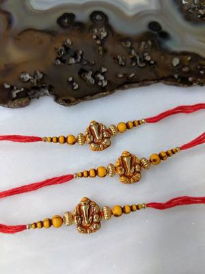 Set Of 3 Ganesh Ji Designer Gold Yellow Bead Multicolor Thread Rakhi For Brother 1