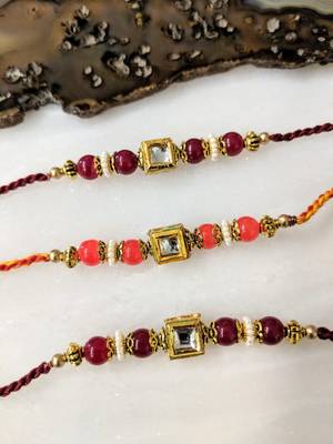 Set Of 3 Kundan Stone Red And Orange Beads Multicolor Thread Rakhi For Brother 1