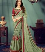 Light green printed chiffon saree with blouse