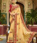 Peach embroidered silk saree with blouse