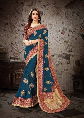 Dark green embroidered art silk saree with blouse 1