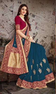 Dark green embroidered art silk saree with blouse 2