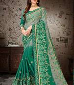 Green embroidered chiffon saree with blouse