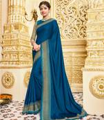 Blue embroidered satin saree with blouse