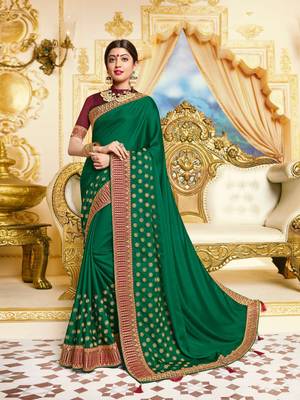 Green embroidered satin saree with blouse 1