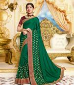Green embroidered satin saree with blouse