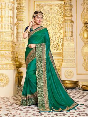 Green embroidered satin saree with blouse 1