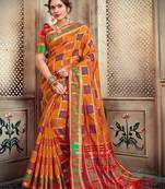 Orange woven silk blend saree with blouse