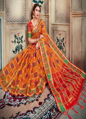 Orange woven silk blend saree with blouse 2