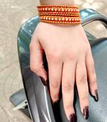 Orange bangles-and-bracelets