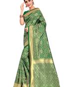 Green woven art silk saree with blouse