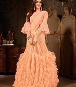Peach plain georgette ruffle saree with blouse