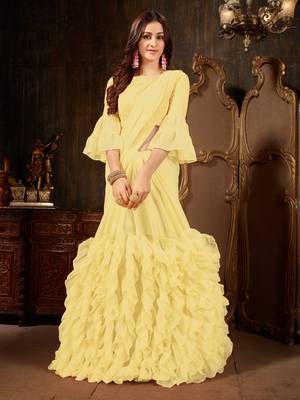 Yellow plain georgette ruffle saree with blouse 1