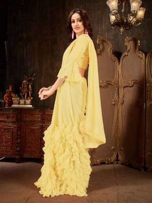 Yellow plain georgette ruffle saree with blouse 2
