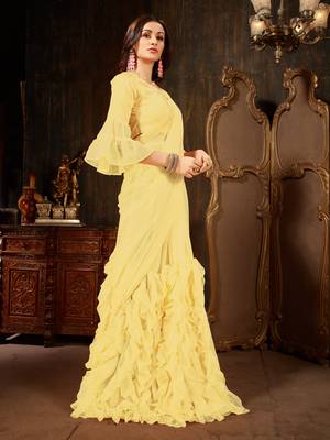 Yellow plain georgette ruffle saree with blouse 3