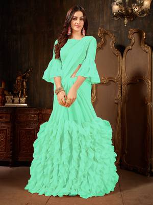 Turquoise plain georgette ruffle saree with blouse 1