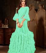 Turquoise plain georgette ruffle saree with blouse