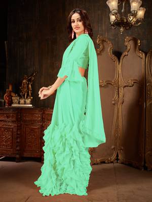 Turquoise plain georgette ruffle saree with blouse 2