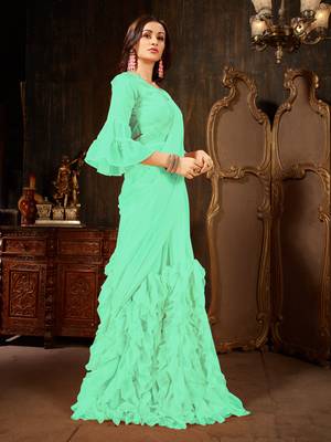 Turquoise plain georgette ruffle saree with blouse 3