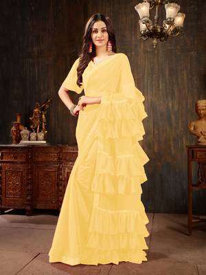 Yellow plain georgette ruffle saree with blouse 1