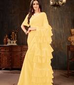 Yellow plain georgette ruffle saree with blouse