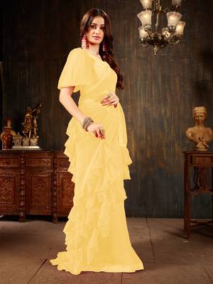 Yellow plain georgette ruffle saree with blouse 3