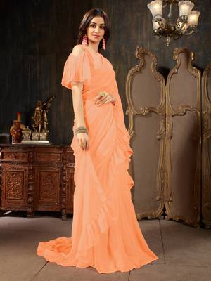 Peach plain georgette ruffle saree with blouse 3