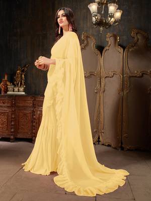 Yellow plain georgette ruffle saree with blouse 2