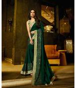 green embroidered art silk saree with blouse