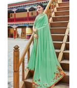 green printed georgette saree with blouse