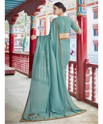 turquoise printed georgette saree with blouse 1