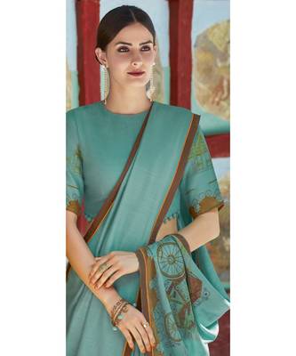 turquoise printed georgette saree with blouse 2