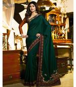 green embroidered art silk saree with blouse