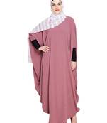 Modest Forever  Onion-pink embroidered nida irani kaftan abaya