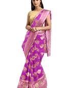 Pink woven banarasi saree with blouse